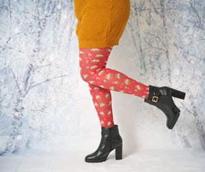 Red tights with christmas puddings