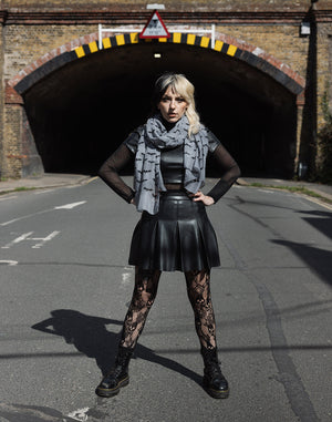 Model wearing bats printed scarf grey and black and rose skull tights from Pamela Mann