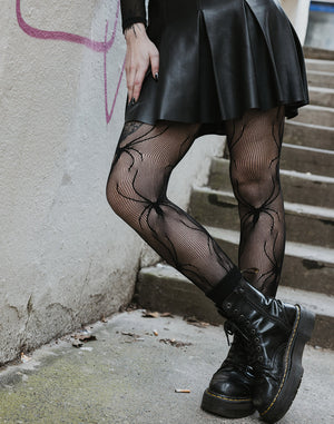 Net tights with spider pattern from Pamela Mann's wholesale alternative tights range